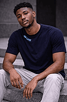 Men’s Navy Blue T-Shirt with Royal Roar Lion Graphic – Fierce. Artistic. Canadian. (Relaxed)