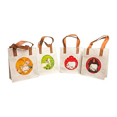 Canvas bag with brown leather feel handle digital cow printed design